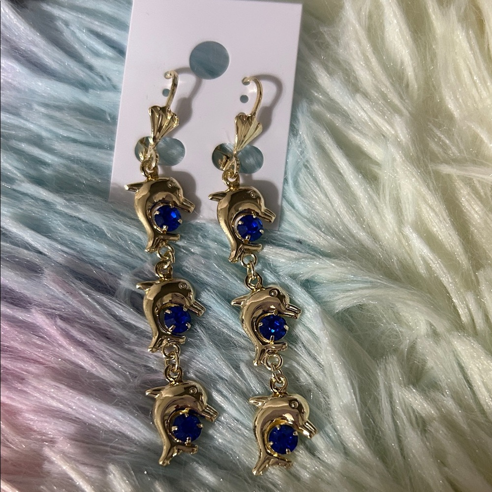 Chic Gold Dolphin Earrings with Deep Blue Gems